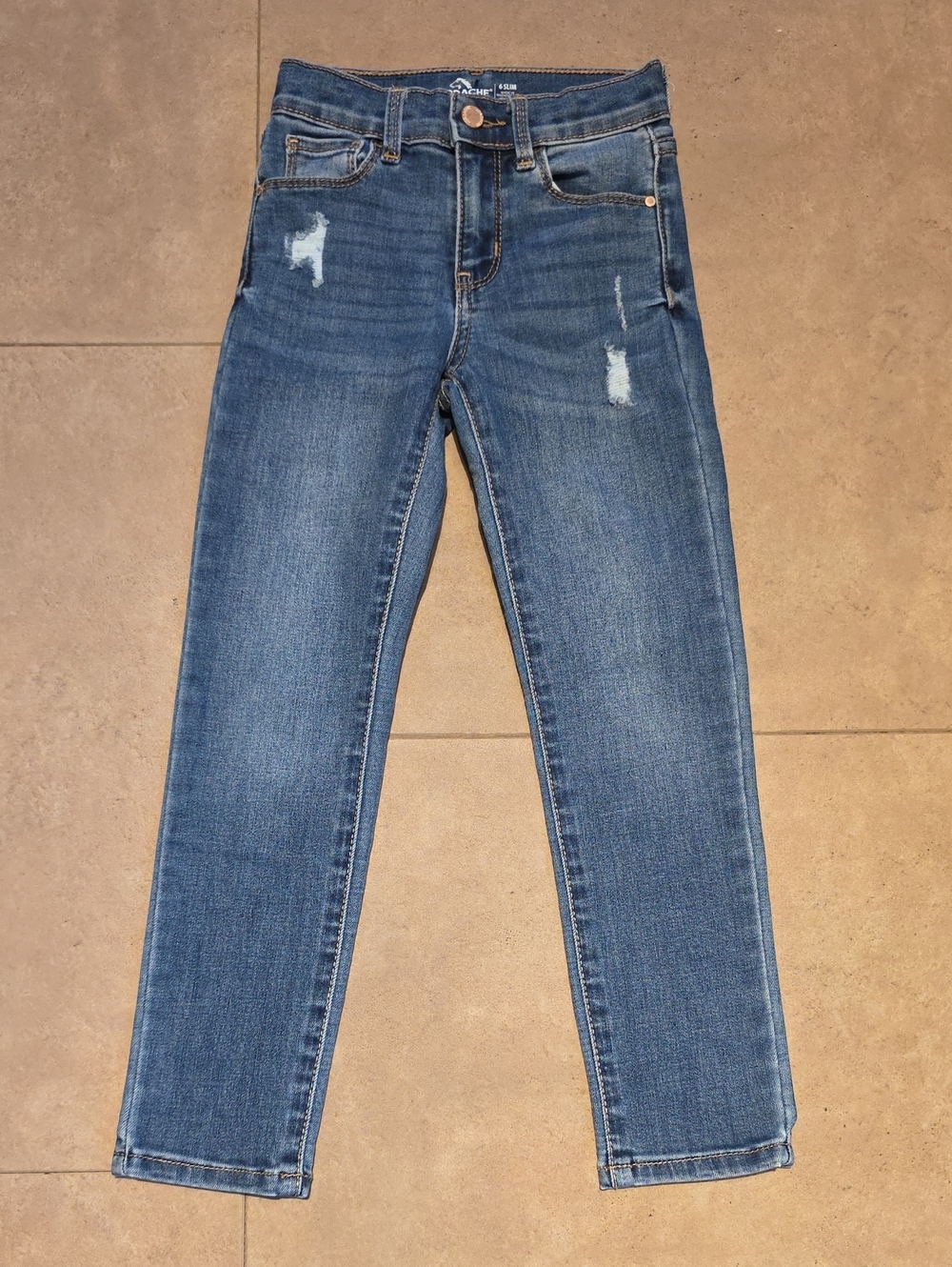 Jordache Girl's Skinny Jeans in Mid Blue with Light Distressing. Size 6 Slim